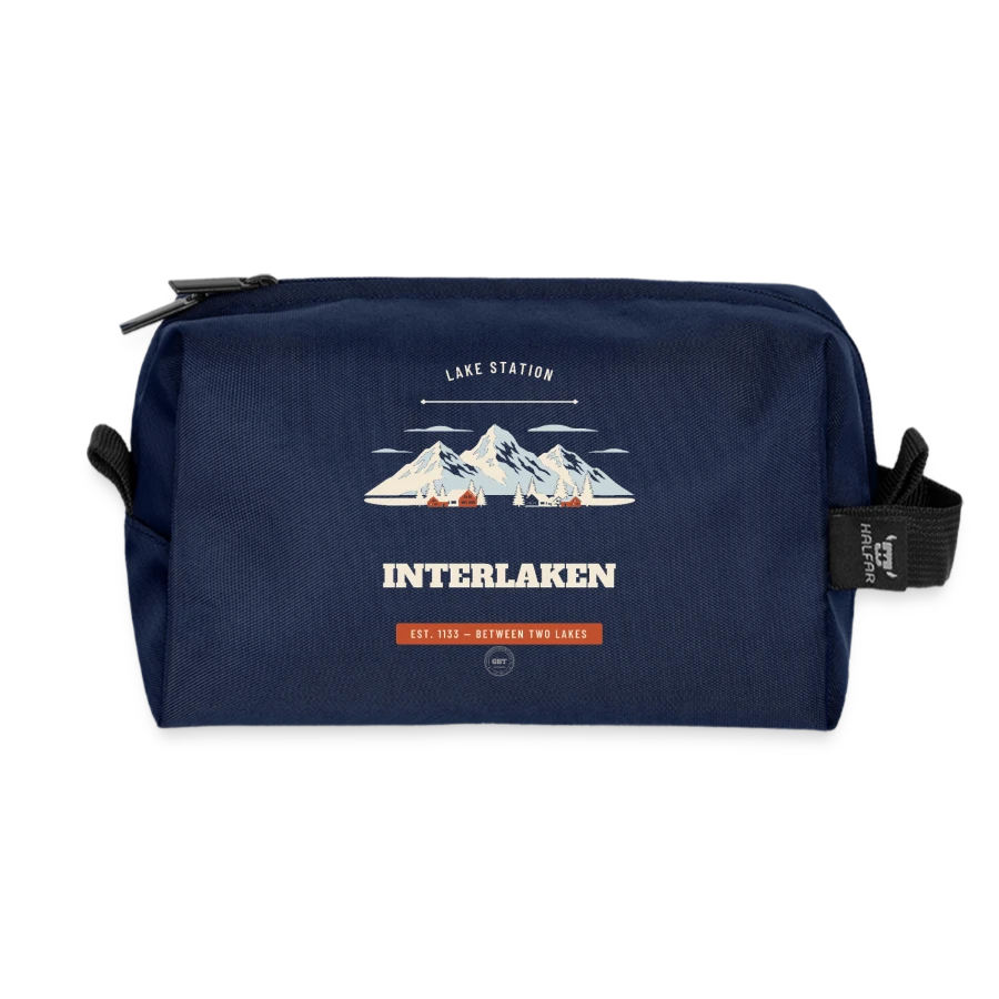 Interlaken badge on a recycled toiletry zip bag, navy