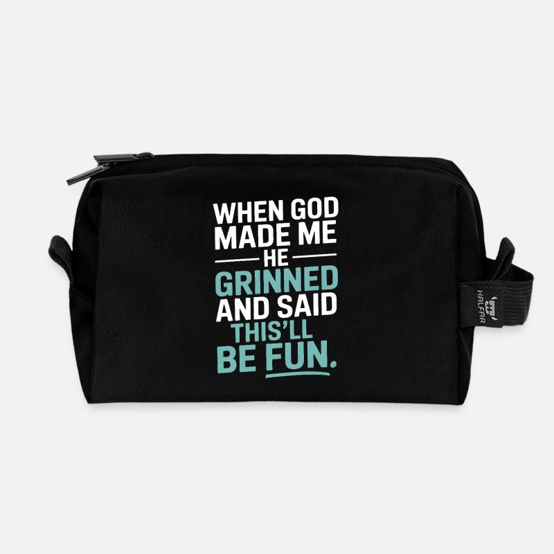 When God made me, he grinned! - Recycled Toiletry Zip Bag - black