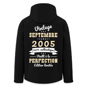 20th Anniversary - Vintage - September 2005 - Men’s Recycled Softshell Jacket by Stanley/Stella - black - Back - AI Model Male 185 light (185cm)