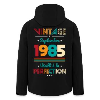 40th Birthday - Vintage - September 1985 - Men’s Recycled Softshell Jacket by Stanley/Stella - black - Back - AI Model Male 185 light (185cm)