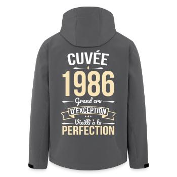 1986 – Aged to perfection - Men’s Recycled Softshell Jacket by Stanley/Stella - black - Back - AI Model Male 185 light (185cm)