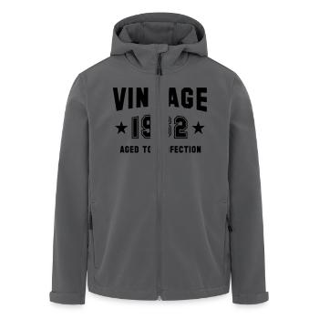 VINTAGE 1962 - Aged To Perfection - Men’s Recycled Softshell Jacket by Stanley/Stella - black - Front - AI Model Male 185 light (185cm)