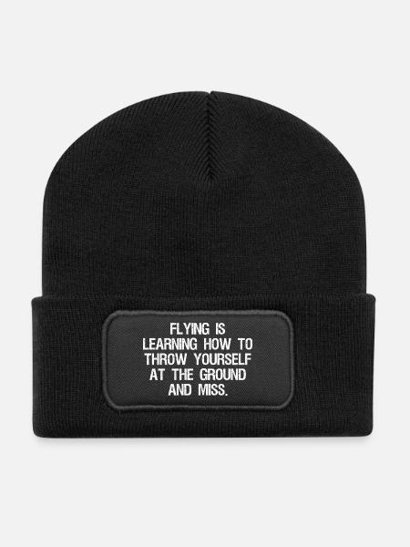 flying is learning how to throw yourself at the - Recycled Patch Beanie - black