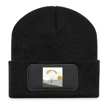 Paraglider segelt in den Bergen Sonnenuntergang - Recycelte Patch Beanie - Schwarz - Vorne