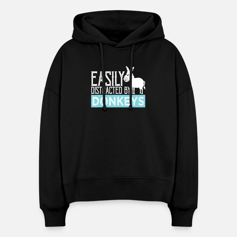Facilement distrait par les ânes - Sweat à capuche bio Nora coupe boxy Stanley/Stella Femme - noir