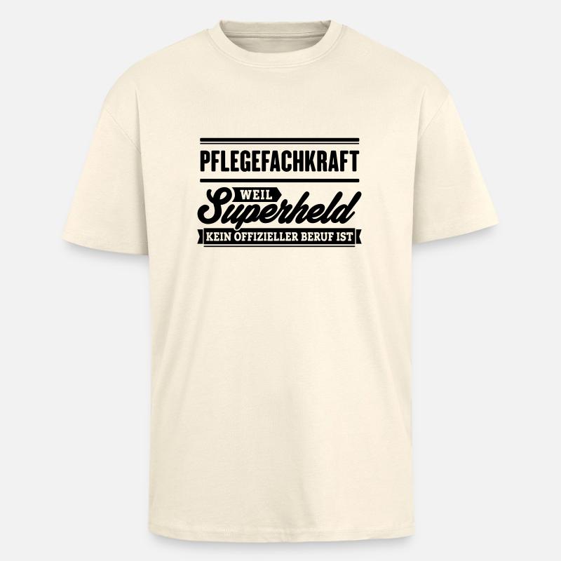 Superheld Pflegefachkraft - Oversized Heavyweight Unisex T-Shirt - Creme