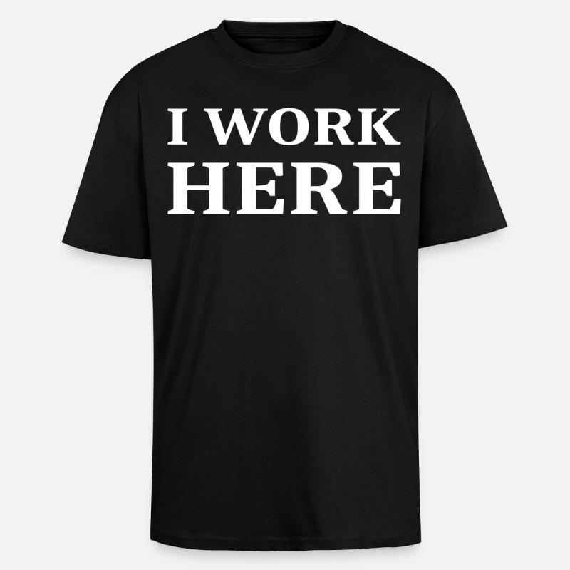 I work here - Unisex Oversized Heavyweight T-shirt - black