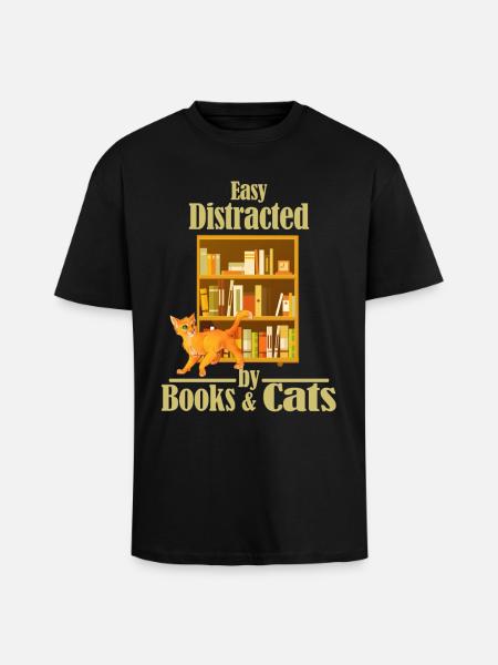 Easily distracted by books and cats - Unisex Oversized Heavyweight T-shirt - black