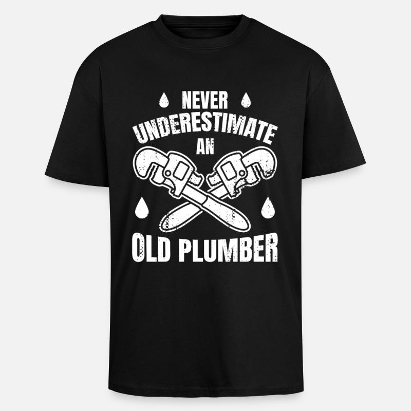 Never Underestimate An Old Plumber - Unisex Oversized Heavyweight T-shirt - black