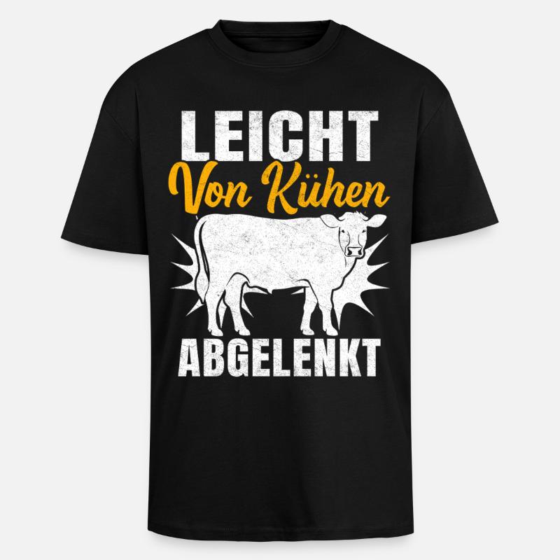 Easily distracted by cows - Unisex Oversized Heavyweight T-shirt - black