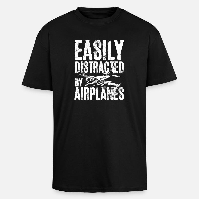 Easily distracted by airplanes - Oversized Heavyweight Unisex T-Shirt - Schwarz