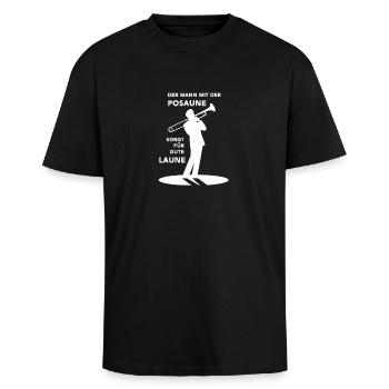 Der Mann mit der Posaune sorgt für gute Laune - Oversized Heavyweight Unisex T-Shirt - Schwarz - Vorne - Alina (178cm) & Michal (187cm)