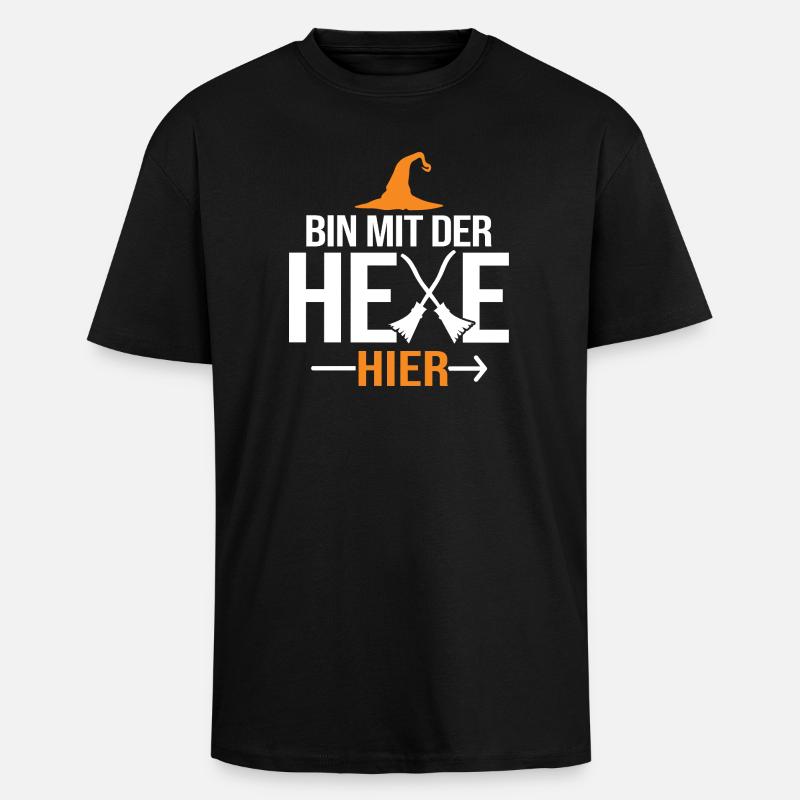 I'm here with the witch - Unisex Oversized Heavyweight T-shirt - black