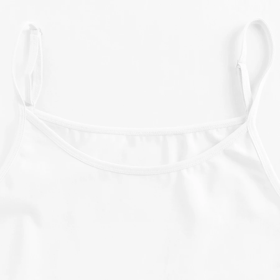Montreux badge on a women's premium organic spaghetti strap top, white, neck label