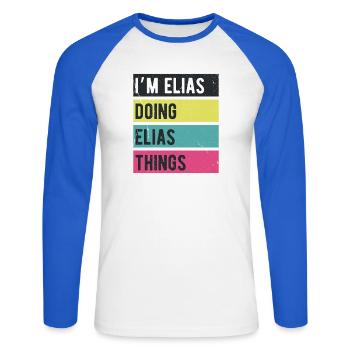 Je suis Elias qui fait Elias Things Rétro Colors - T-shirt baseball manches longues Homme - blanc/bleu royal - Devant - Nik (191cm)