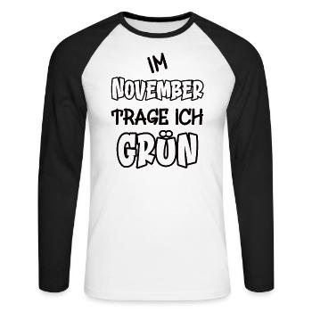 Im November trage ich grün Spruch Farbe grün - Unisex Baseballshirt langarm - Weiß/Schwarz - Vorne - Nik (191cm)
