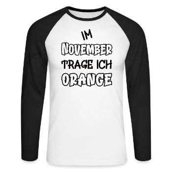 En novembre, je porte de l’orange en disant couleur orange - T-shirt baseball manches longues Homme - blanc/noir - Devant - Nik (191cm)