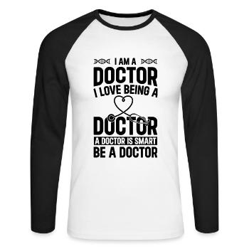 Je suis médecin. J’adore être médecin. Un médecin est - T-shirt baseball manches longues Homme - blanc/noir - Devant - Nik (191cm)