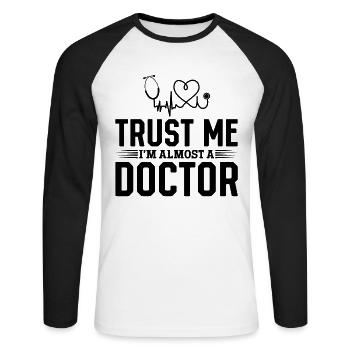 Funny Doctor - Trust Me I Am Almost A Doctor - Unisex Long Sleeve Baseball T-Shirt - white/black - Front - Nik (191cm)