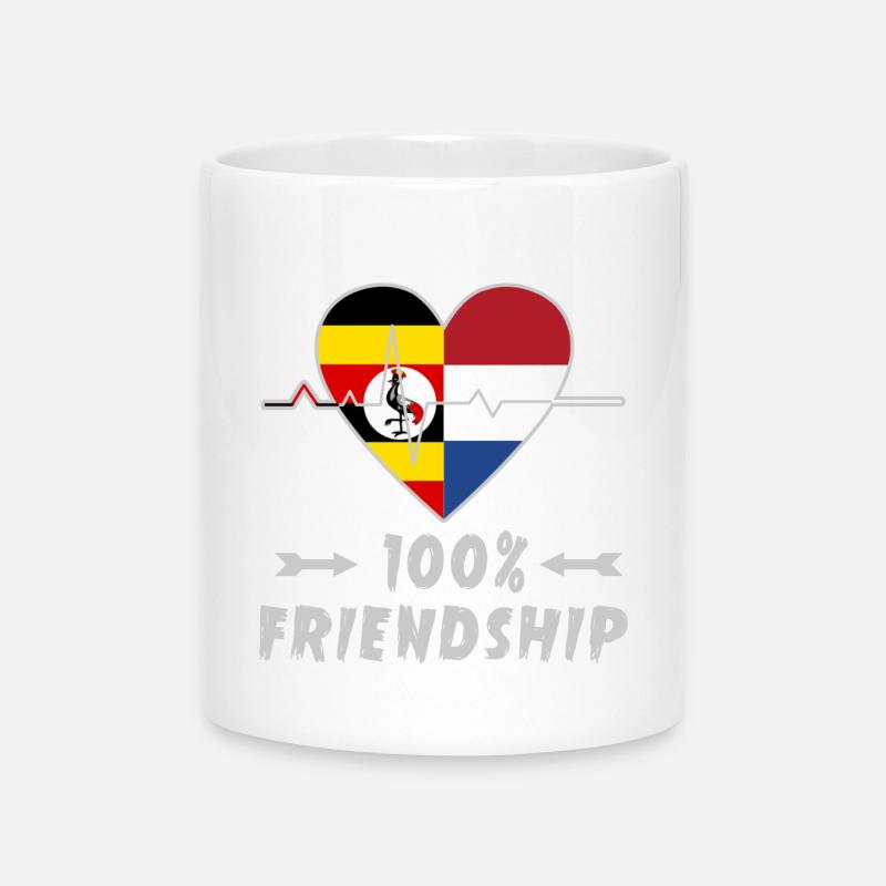 Uganda und Niederlande 100% Freundschaft - Tasse mit Herzhenkel - Weiß