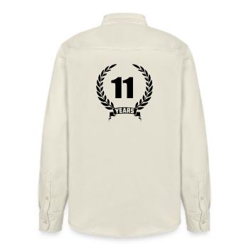 Lauwerkrans 11 years with number and banner year - Relaxed Fit Unisex Organic Shirt by Stanley/Stella - soft Ecru - Back - AI Model Male 178 light (178cm)