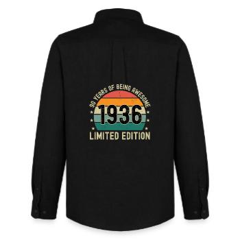 90 ans d’être génial 1936 Édition limitée - Chemise Oxford homme Stanley/Stella - noir - Dos - AI Model Male 185 dark (185cm)