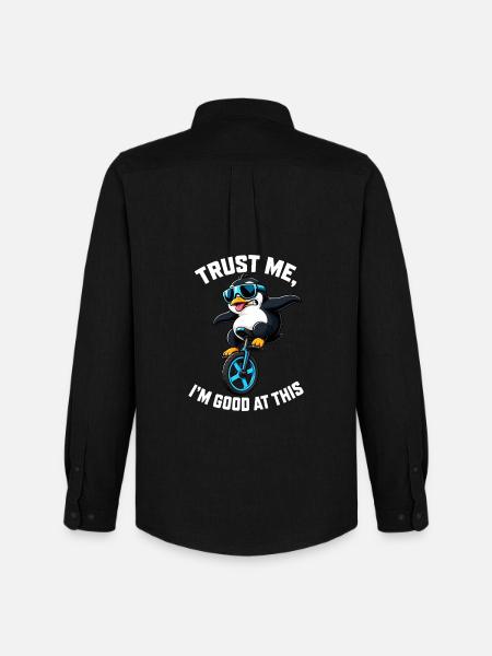 Cool penguin on unicycle with saying - Men's Oxford Shirt by Stanley/Stella - black