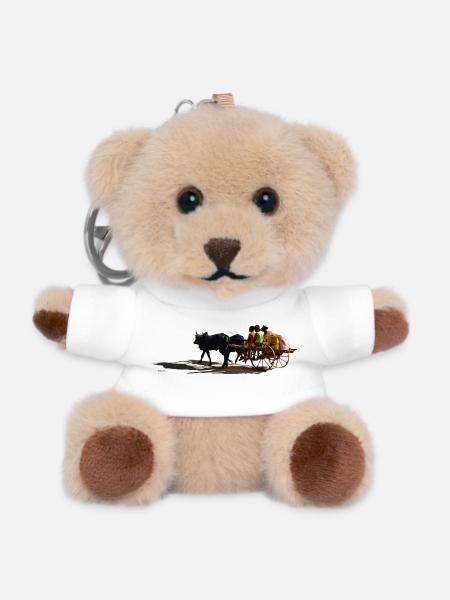 African donkey carriage and passengers - Teddy Keyring - white