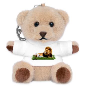 Lion et agneau dans une prairie d’herbe - Porte-clés ourson - blanc - Devant