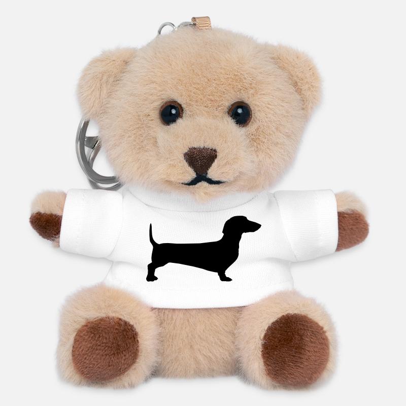 A silhouette outline of a short haired dachshund - Teddy Keyring - white