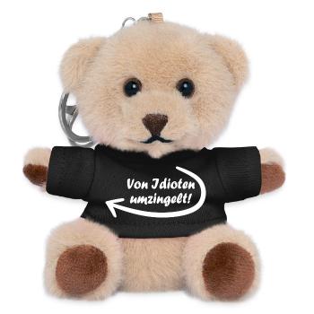Von Idioten umzingelt. Spruch, Geschenkidee - Teddy Schlüsselanhänger - Schwarz - Vorne