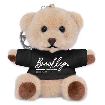 Stadtbild mit Neonlichtern und Bergblick - Teddy Schlüsselanhänger - Schwarz - Vorne