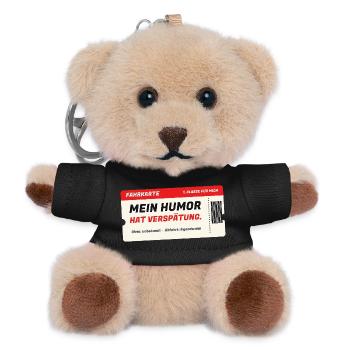 Fahrkarte: Mein Humor hat Verspätung - Teddy Schlüsselanhänger - Schwarz - Vorne