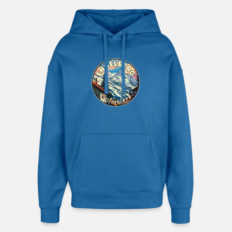 Découvrez Alpine Engelberg en Suisse - Sweat à capuche unisexe Stanley/Stella Oversized - bleu attentif