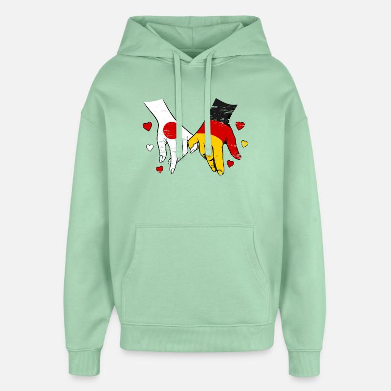 Japan_Deutschland_Flagge_Händehalten utilisés - Sweat à capuche unisexe Stanley/Stella Oversized - jade brumeux