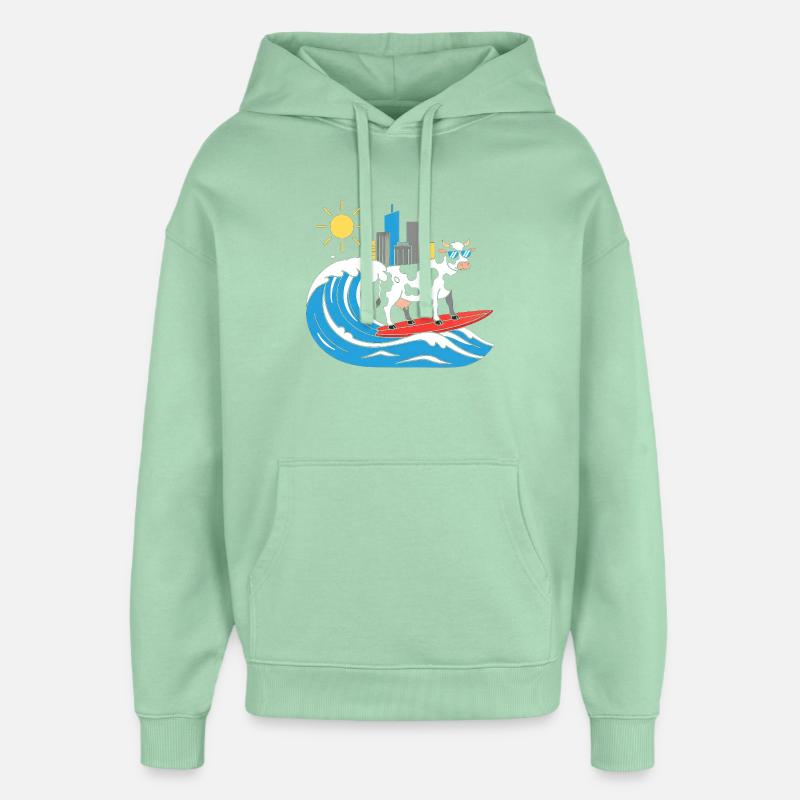 Vache surfeuse à la City-Wave - Sweat à capuche unisexe Stanley/Stella Oversized - jade brumeux