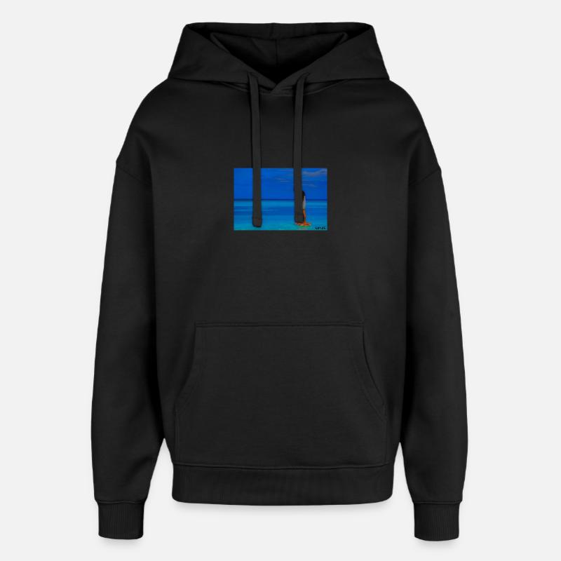 Paddleboarders à la mer tropicale - Sweat à capuche unisexe Stanley/Stella Oversized - noir