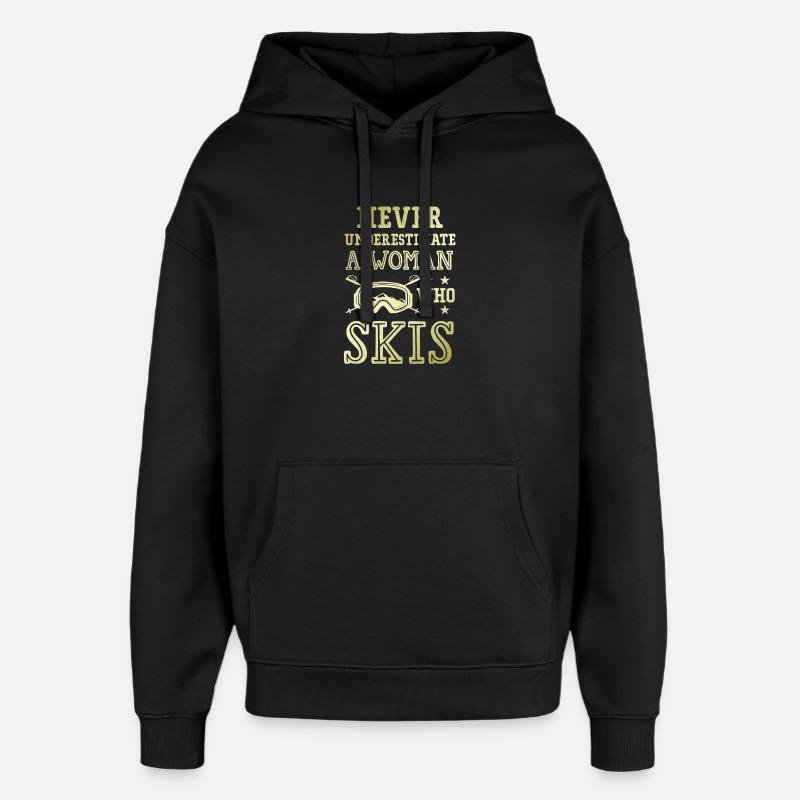 Ne sous-estimez pas une skieuse - Sweat à capuche unisexe Stanley/Stella Oversized - noir
