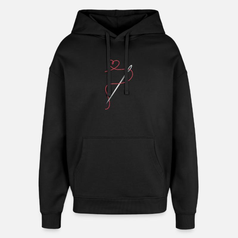 Nadel und Nähgarn mit Herz - Oversized Unisex Hoodie von Stanley/Stella - Schwarz