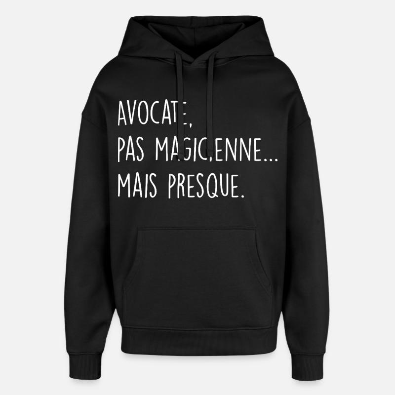 Avocate, pas magicienne… mais presque - Sweat à capuche unisexe Stanley/Stella Oversized - noir