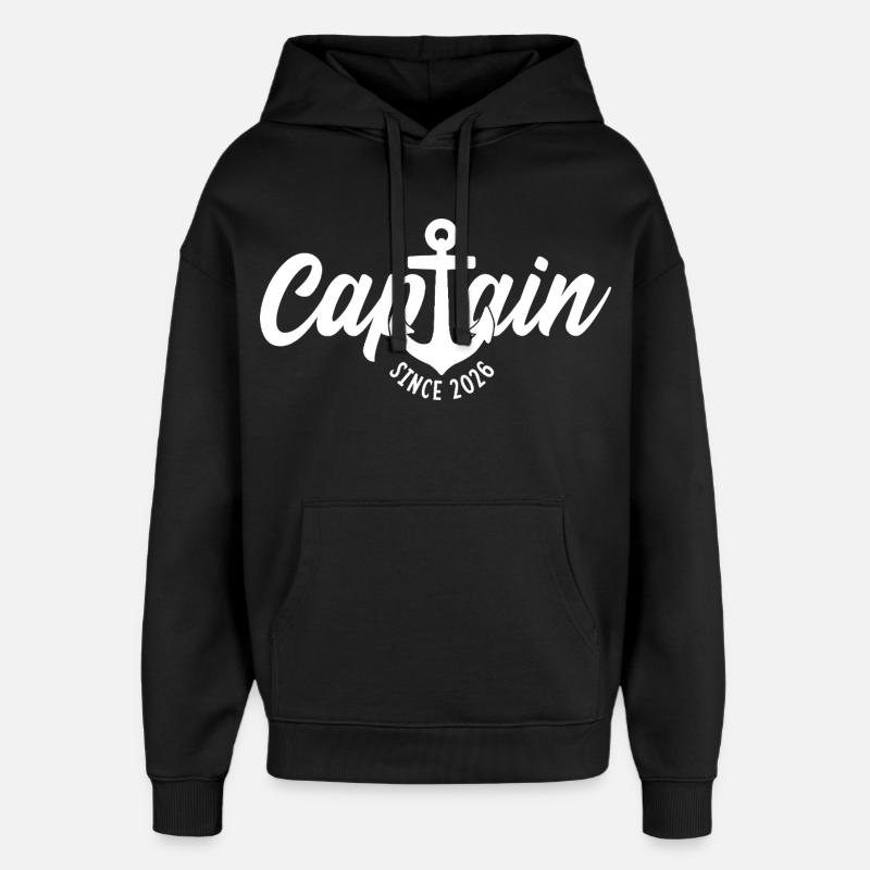 CAPITAINE DEPUIS 2026 CAPITAINE DEPUIS 2026 - Sweat à capuche unisexe Stanley/Stella Oversized - noir