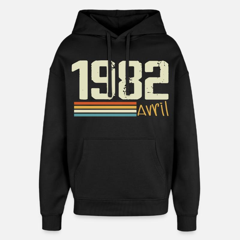 Né en avril 1982 - Sweat à capuche unisexe Stanley/Stella Oversized - noir