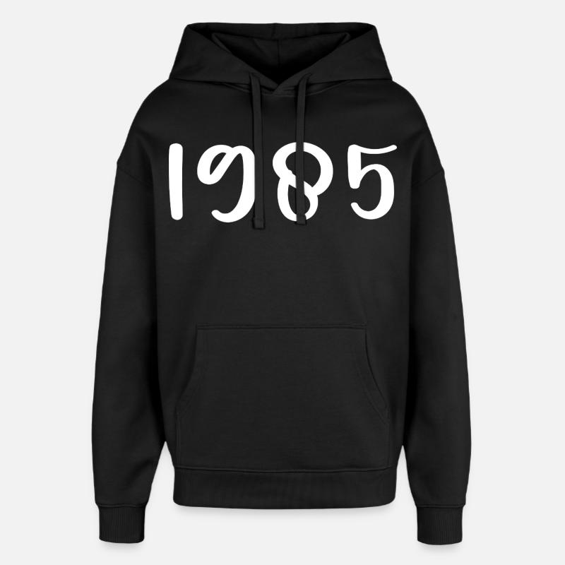 1985 Anniversaire 1985 - Sweat à capuche unisexe Stanley/Stella Oversized - noir
