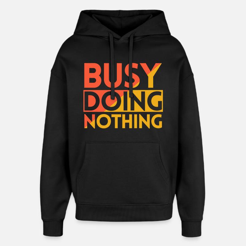 BUSY DOING NOTHING - Oversized Unisex Hoodie by Stanley/Stella - black
