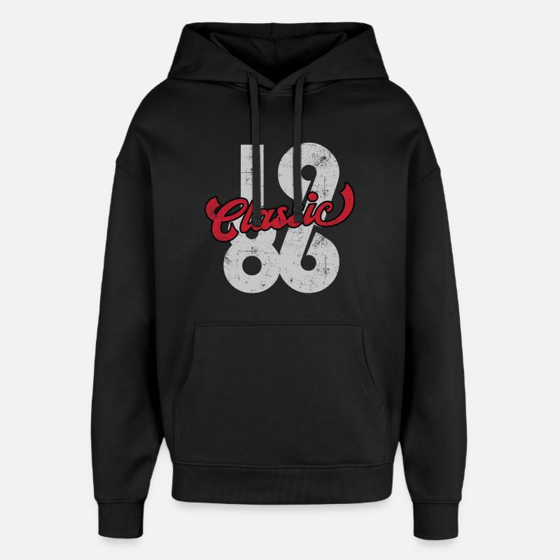 Millésime 1986 - Sweat à capuche unisexe Stanley/Stella Oversized - noir
