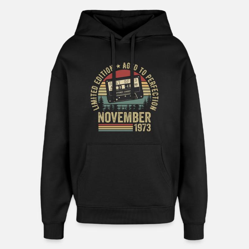 Novembre 1973 - Sweat à capuche unisexe Stanley/Stella Oversized - noir