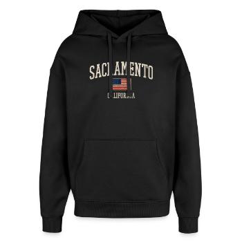 Sacramento Americana Flag Design - Oversized Unisex Hoodie von Stanley/Stella - Schwarz - Vorne - AI Model Female 172 light (172cm) & AI Model Male 185 light (185cm)