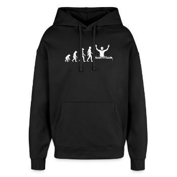 Evolution to a DJ with turntable - Oversized Unisex Hoodie by Stanley/Stella - black - Front - AI Model Female 172 light (172cm) & AI Model Male 185 light (185cm)