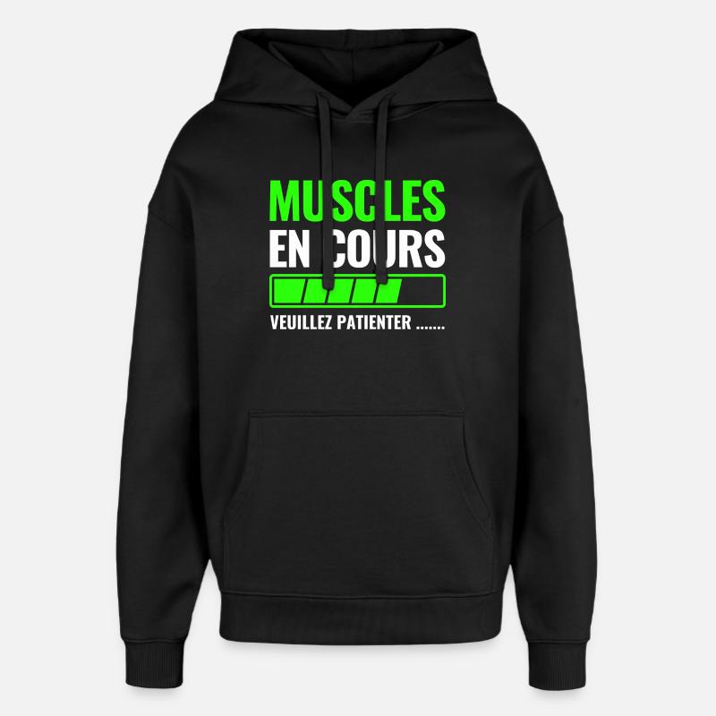 Muscles en cours veuillez patienter - Sweat à capuche unisexe Stanley/Stella Oversized - noir