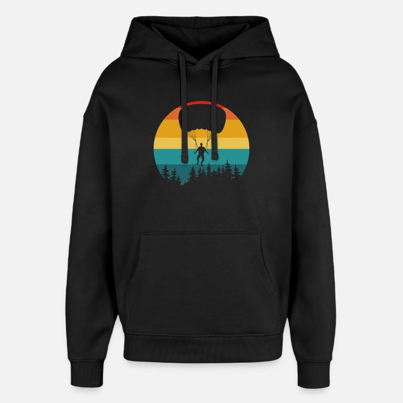 Parachutiste silhouette forêt rétro - Sweat à capuche unisexe Stanley/Stella Oversized - noir